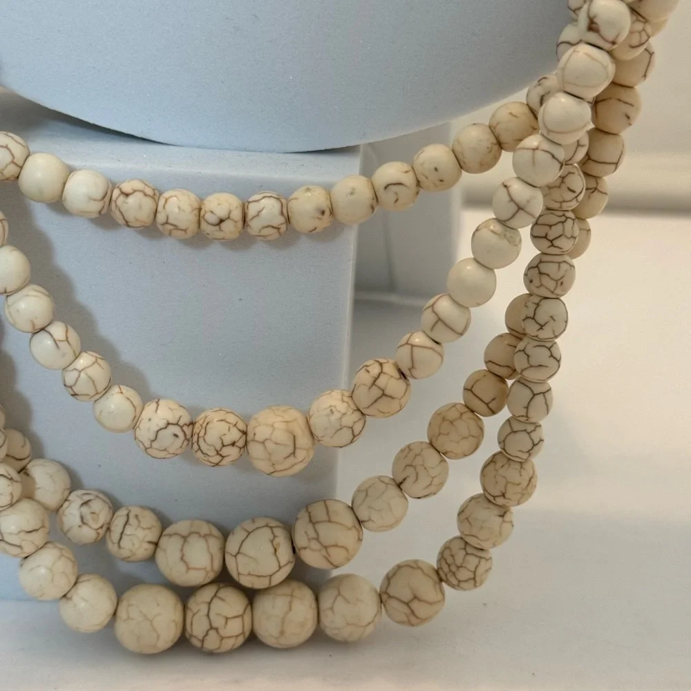 Gorgeous earth tone beaded necklace with brown floral accents